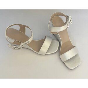 Women’s White/Satin Silver Shoes Size 8 Wedge Sandals With Wrap Around Buckle.